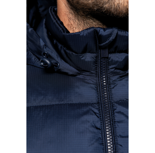 Chaqueta ripstop reciclada con capucha unisex