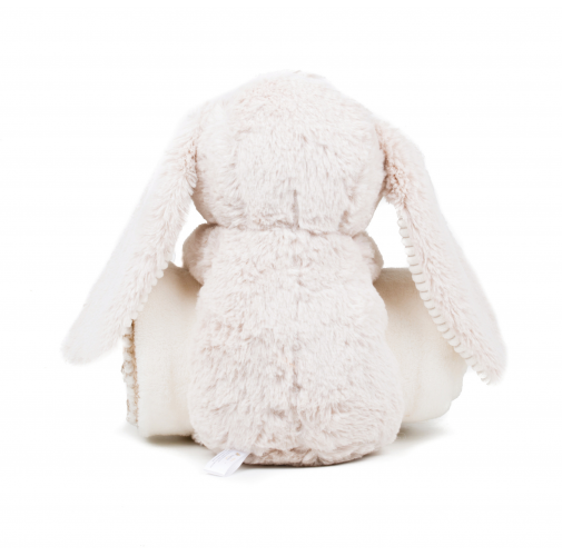 Conejo de peluche y manta