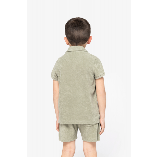 Polo ecorresponsable de rizo niño
