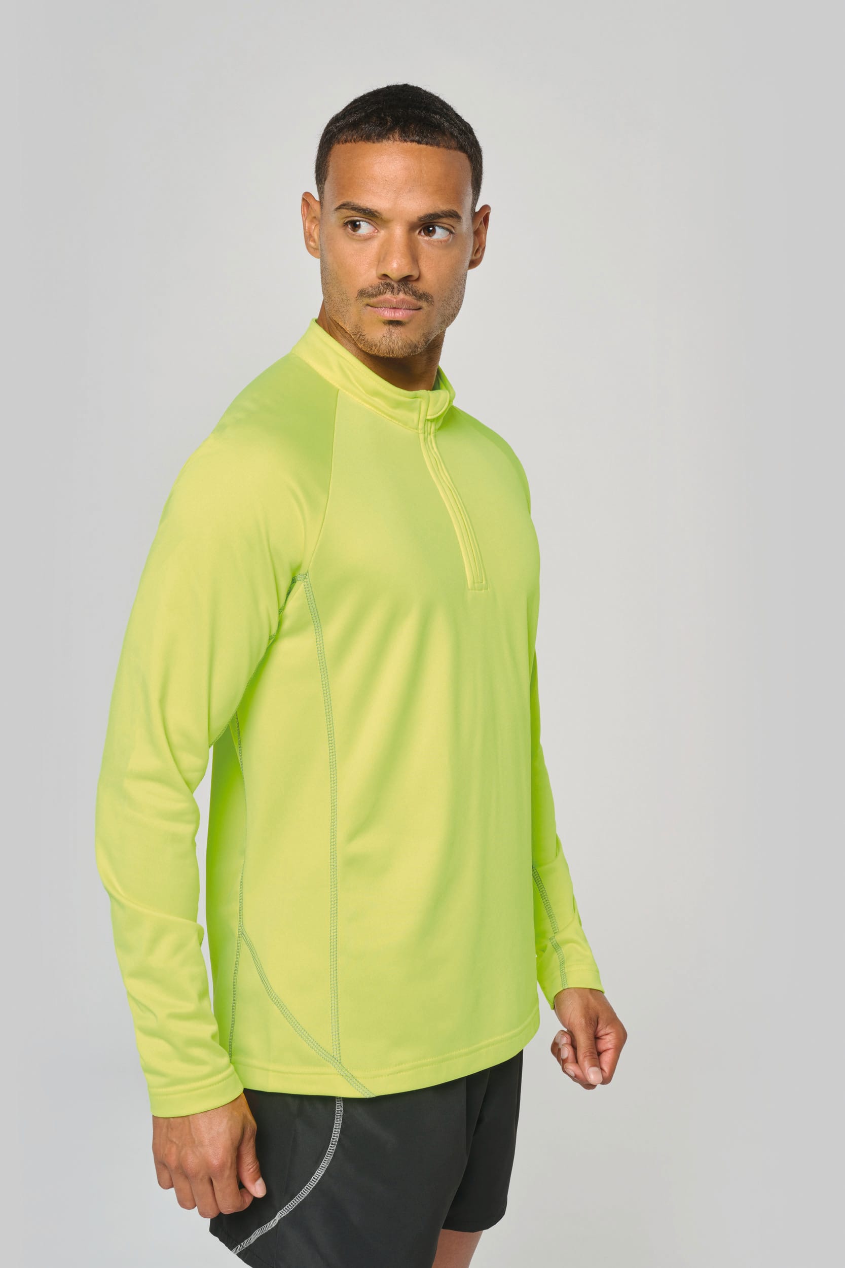 Top deportivo de manga larga ¼ zip hombre