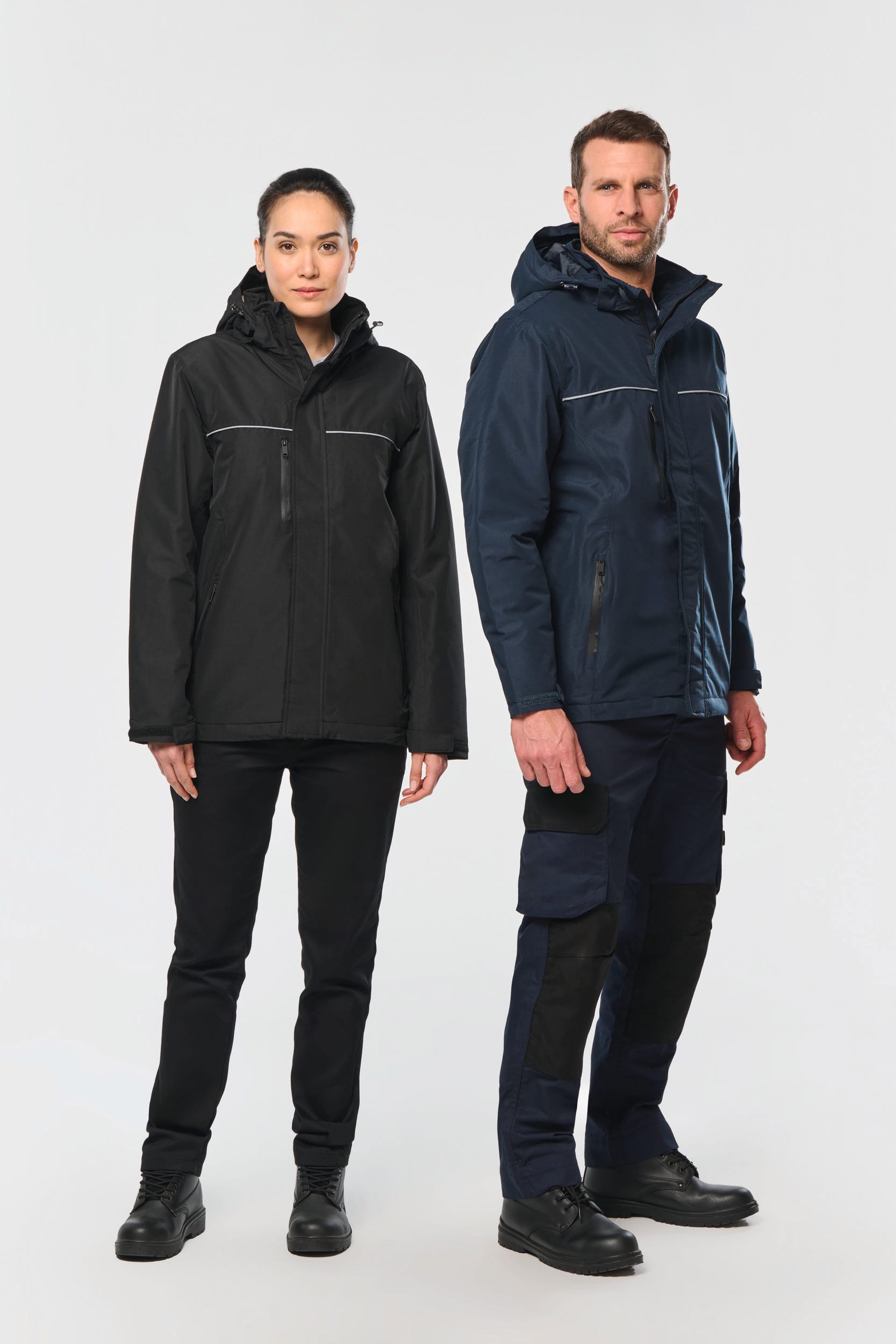 PARKA PERFORMANCE CON CAPUCHA - UNISEX